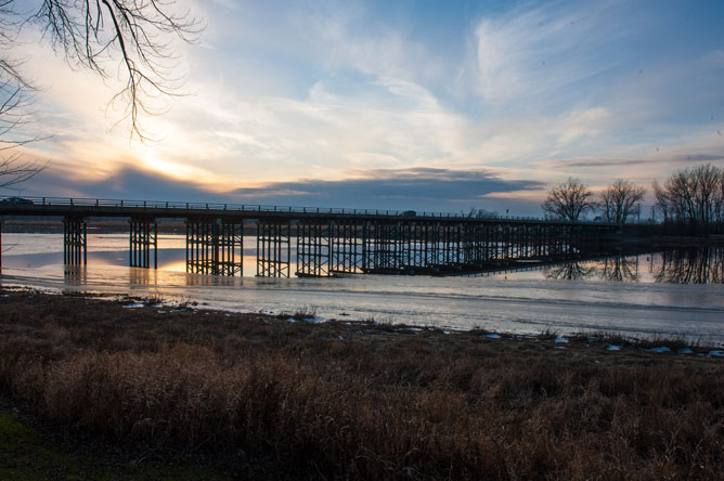 Bridge between Île Dupas and Île aux Castors at sunset